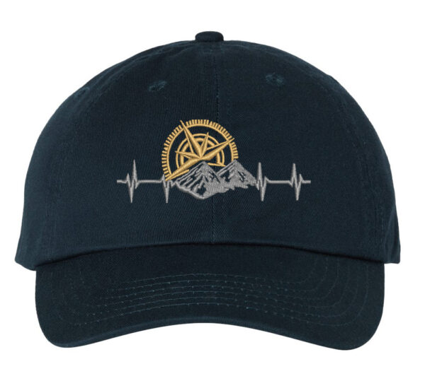 A baseball hat with a mountain and compass design embroidered on the front, perfect for outdoor enthusiasts and hikers.