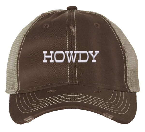 Image shows a distressed trucker hat with the word "Howdy" embroidered on the front. The hat features a mesh back and snapback closure.